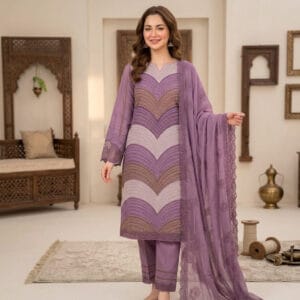 Model wearing a luxury lavender embroidered 3 piece suit with chevron details and matching dupatta.